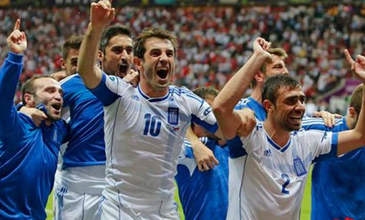 greece captain giorgos karagounis defies odds
