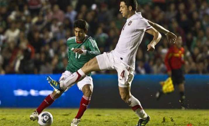 hernandez double as mexico beats serbia