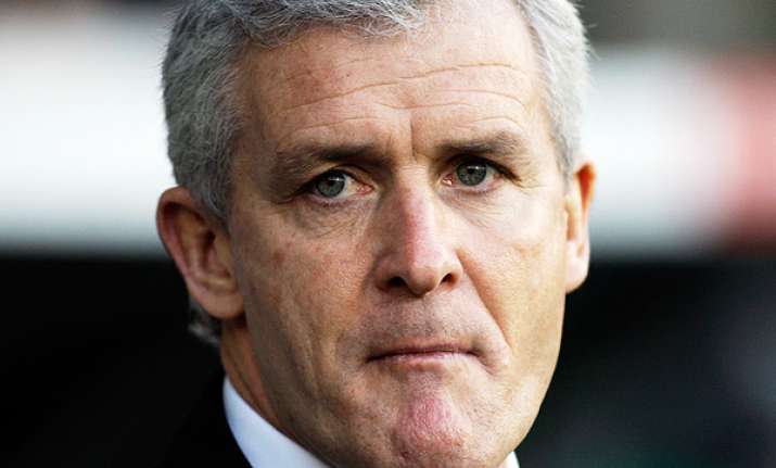 hughes deciding whether qpr job matches ambitions