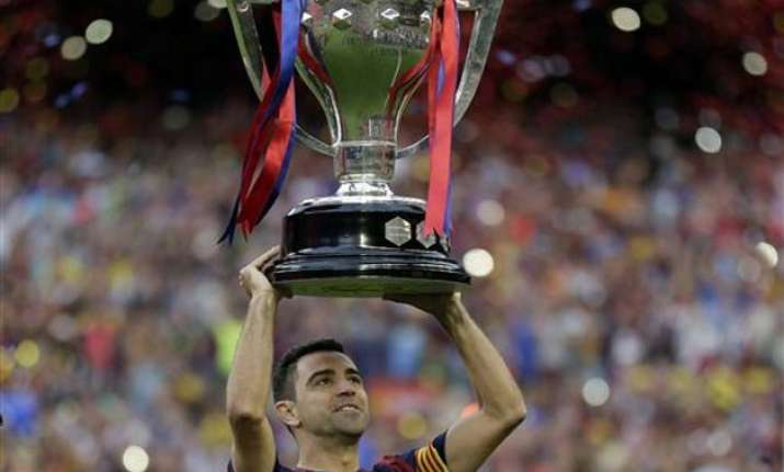 xavi to leave barcelona after 17 trophy filled seasons