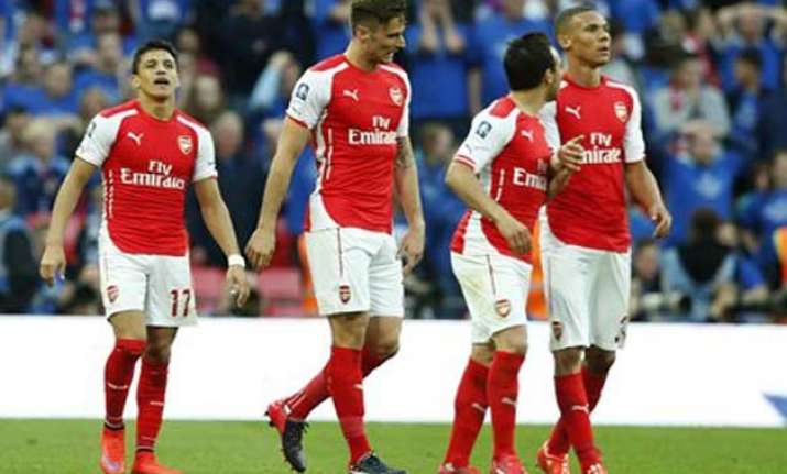 arsenal looks to delay chelsea s title coronation