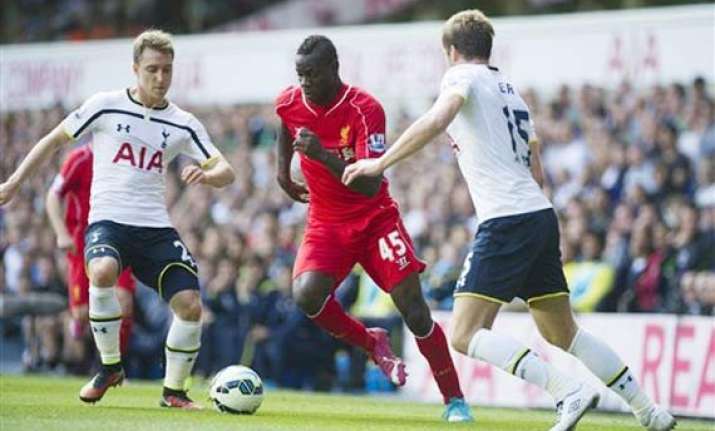 balotelli misfires but liverpool wins at spurs