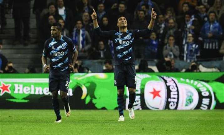 porto advances in champions league with 4 0 win over basel