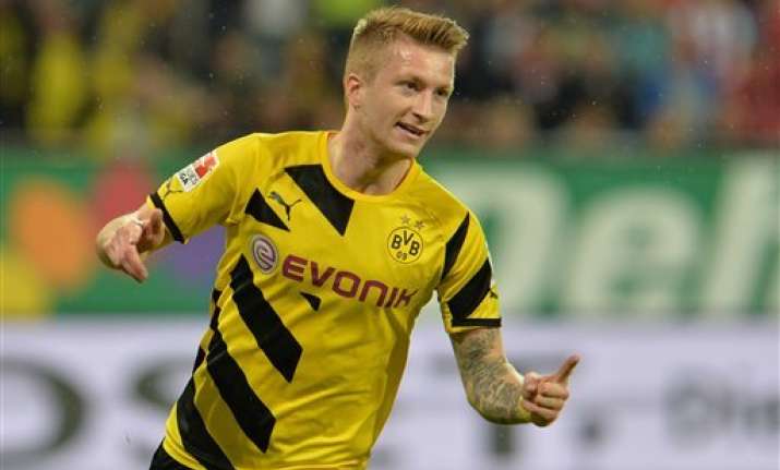 dortmund beats augsburg 3 2 for 1st bundesliga win