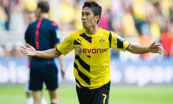 dortmund edges 10 man hannover 3 2 in bundesliga