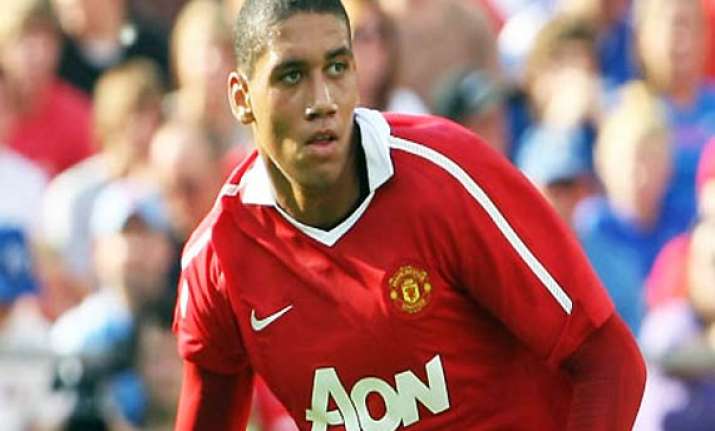 man united gives smalling 5 year contract