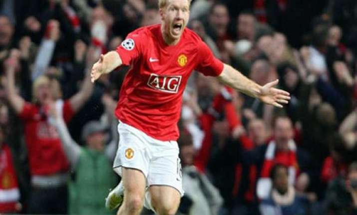 man united midfielder paul scholes retires