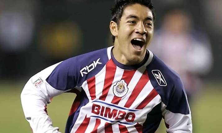 marco fabian scores two goals to beat barcelona 4 1