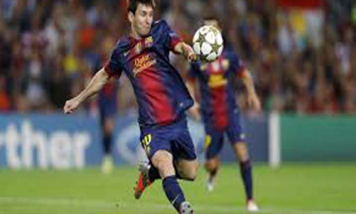 messi earns barcelona a draw at ac milan