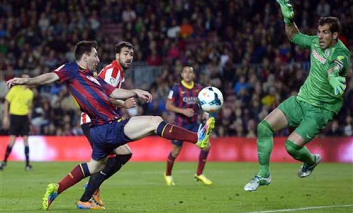 messi helps barcelona end skid beat bilbao 2 1