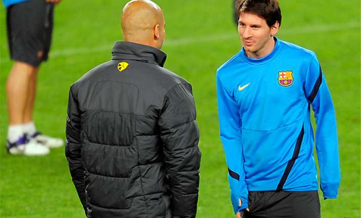 messi pays tribute to barcelona coach guardiola