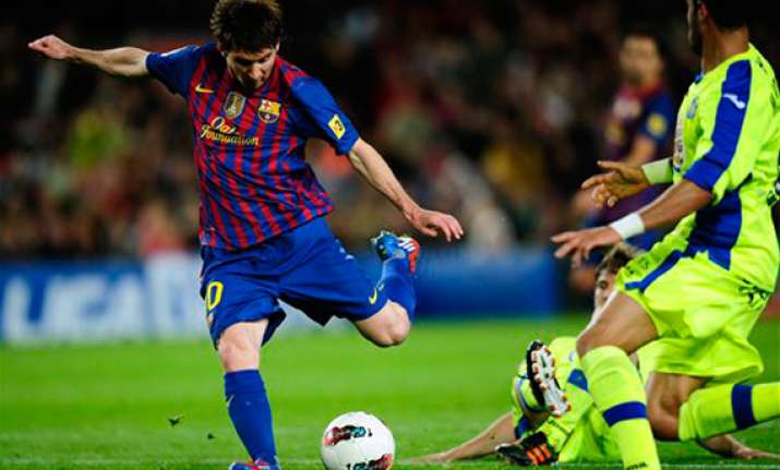 messi s 61st goal leads barcelona past getafe 4 0