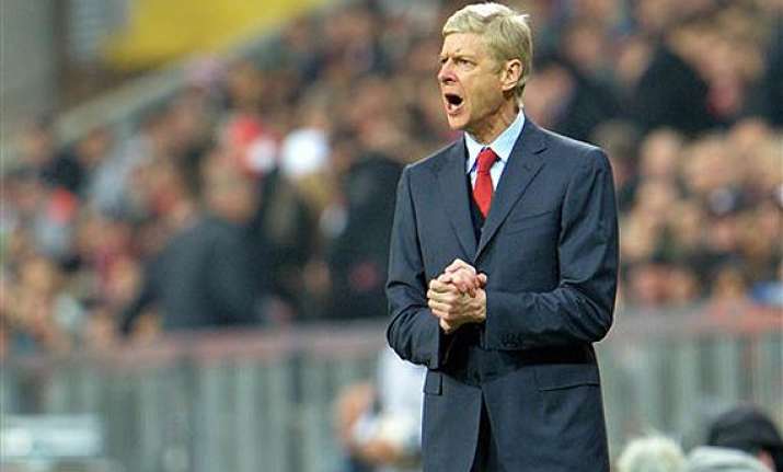 mourinho can t resist dig on wenger s big day.