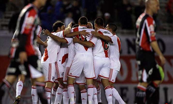 river wins opening game in second division