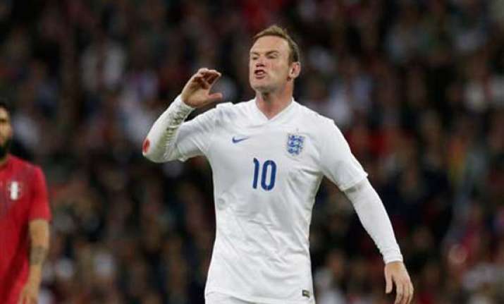 rooney feeling heat as england arrives in miami