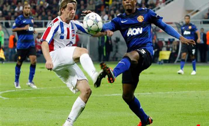 rooney penalties rescue united in champions league