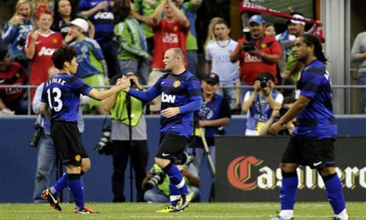 rooney scores hat trick man utd crushes seattle 7 0