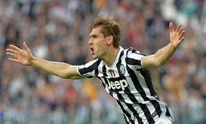 serie a juventus beats livorno 2 0 to restore 8 point lead