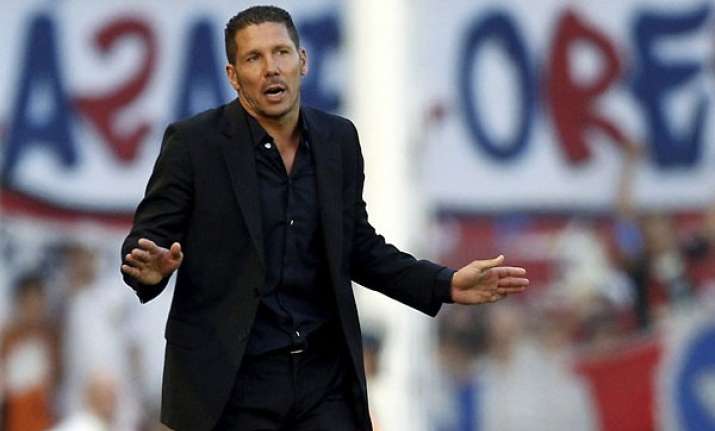 simeone takes over at racing club in argentina
