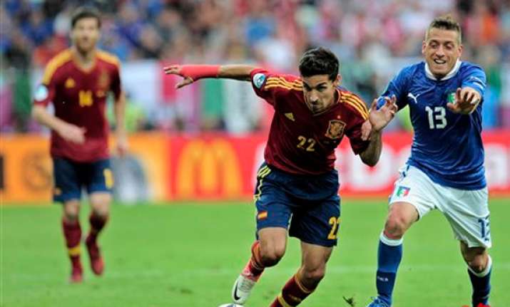 spain considering uefa protest over gdansk pitch