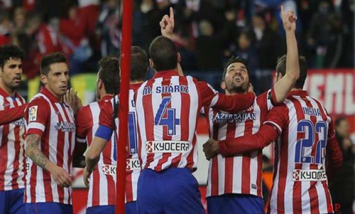spanish league atletico goes top for 1st time since 96