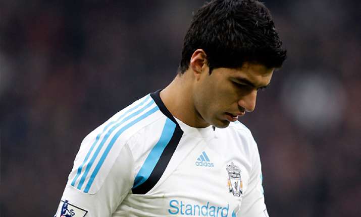 suarez is a disgrace to liverpool says ferguson