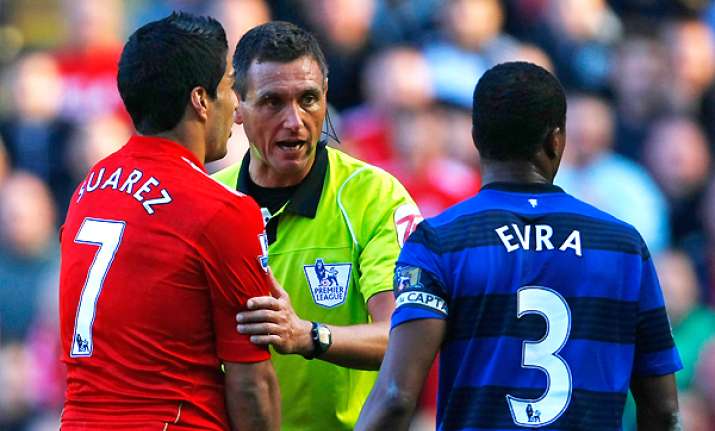 suarez upset by evra allegations