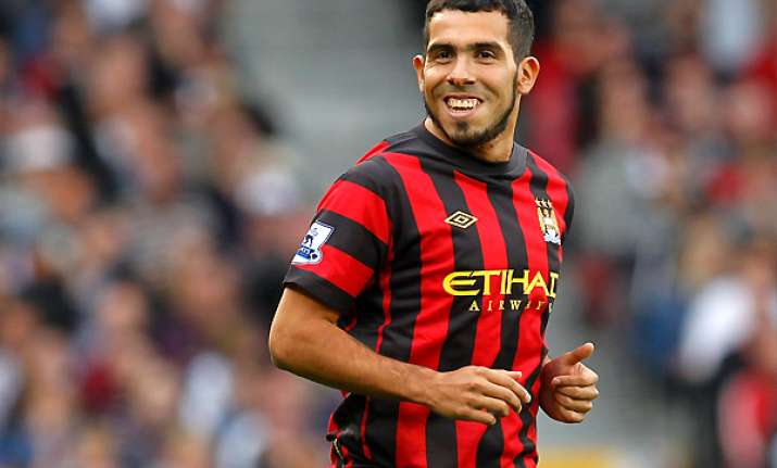 tevez could play for man city in 2 weeks says mancini