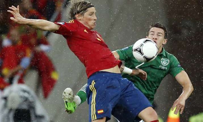 torres scores 2 as spain eliminates ireland