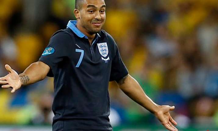 walcott exits training with hamstring problem