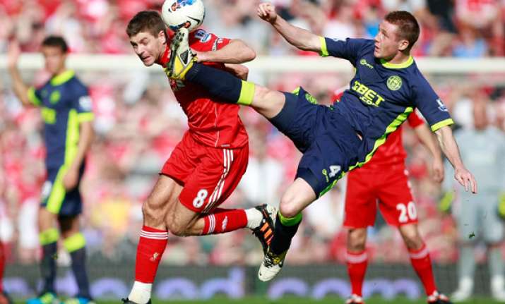 wigan upsets liverpool 2 1 to boost survival hopes
