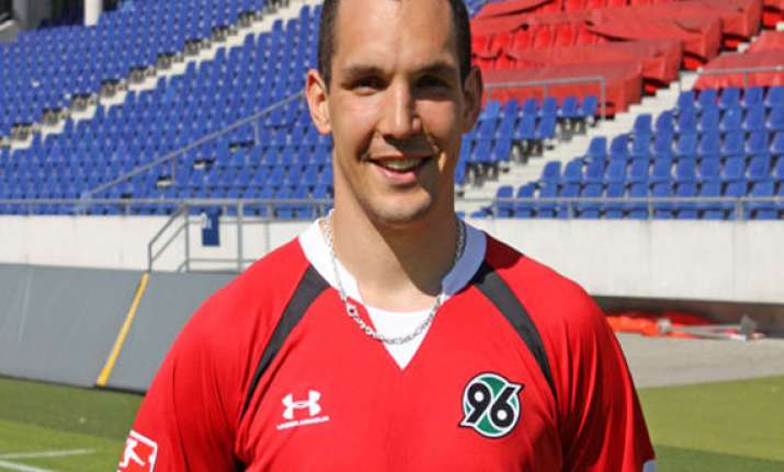 wolfsburg signs defender pogatetz from hannover