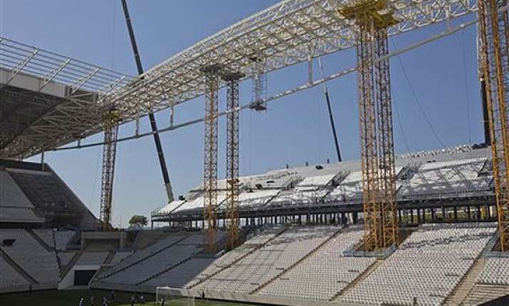worker dies at stadium hosting world cup opener.