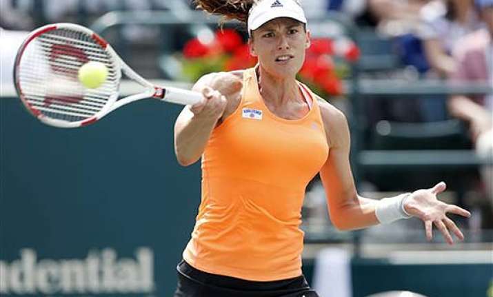 andrea petkovic rallies past eugenie bouchard in 3 sets at