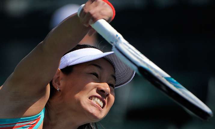 date krumm wins on blustery day at indian wells