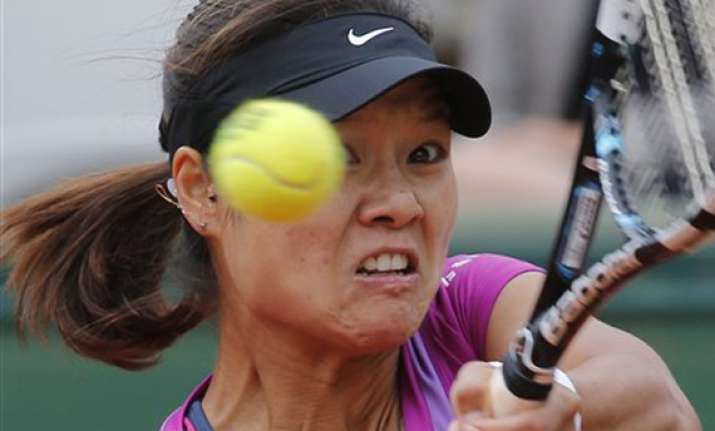 defending champion li knocked out of french open