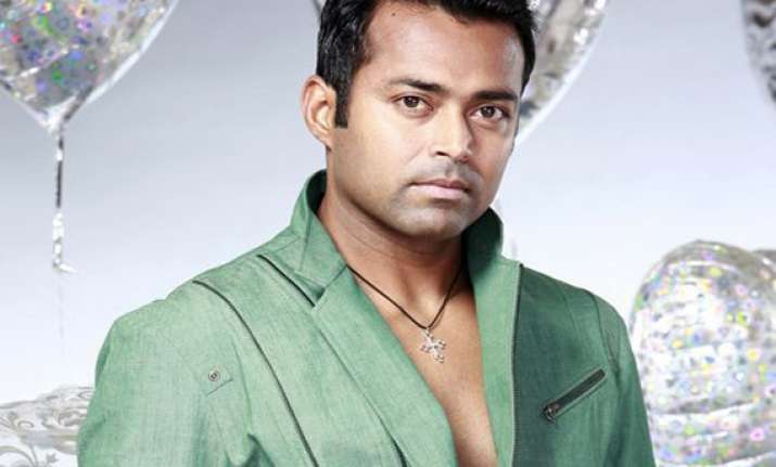 disheartened but paes confirms participation in olympics