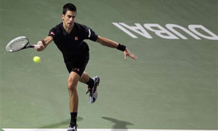 djokovic wins del potro retires in dubai