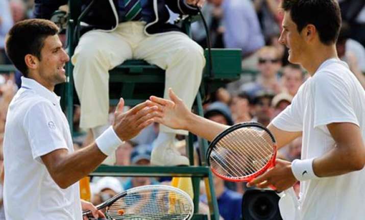 djokovic beats tomic to reach wimbledon semifinals