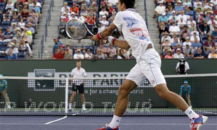 djokovic earns victory over qualifier
