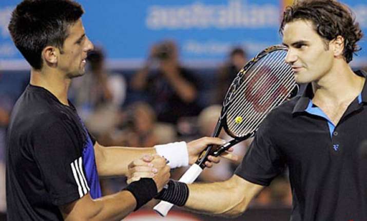 djokovic federer reach third round at french open