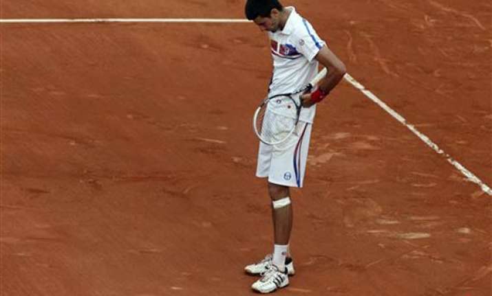 djokovic pulls out of queen s tournament