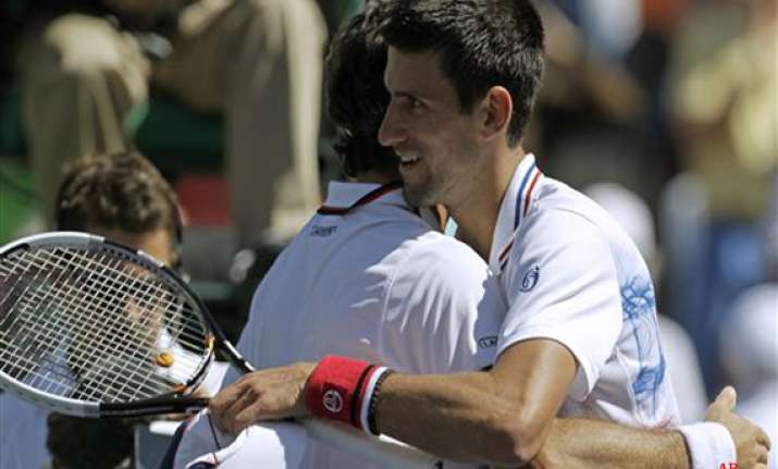 djokovic rallies to win in 3 sets at indian wells