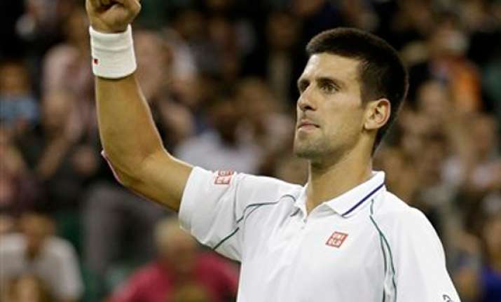 djokovic beats harrison under wimbledon lights