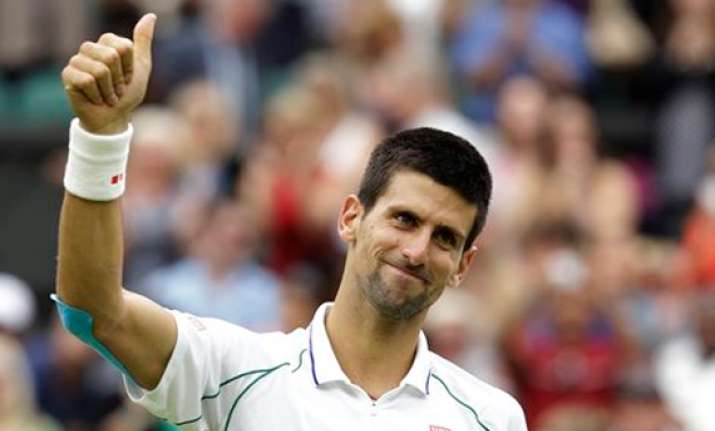 djokovic rallies past stepanek at wimbledon