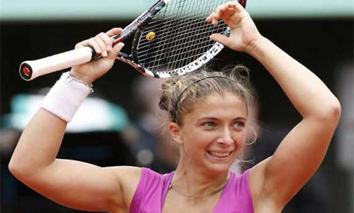 errani tops stosur to reach french open final
