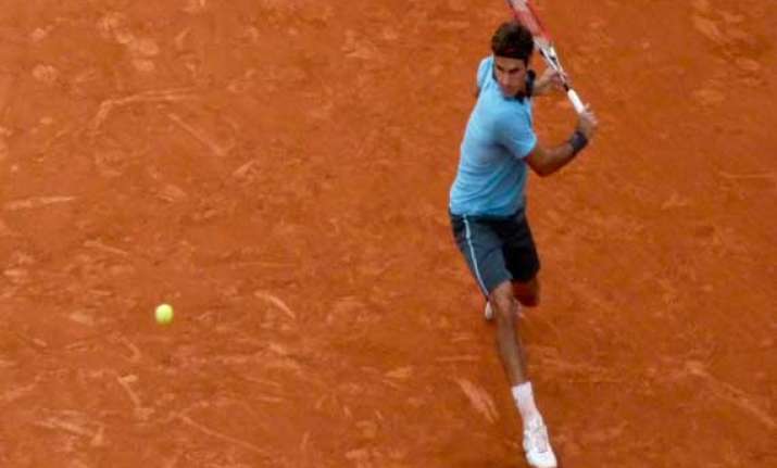 federer williams reach second round of french open