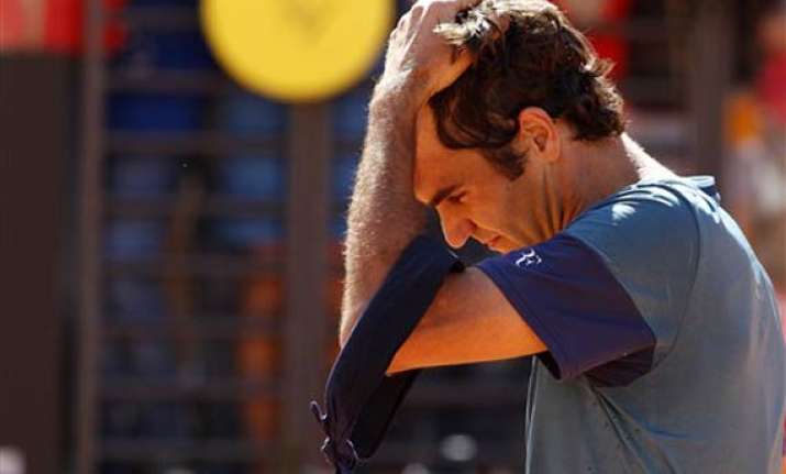 federer beaten in return after boys birth in rome
