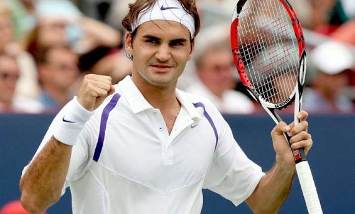 federer beats anderson at paris masters