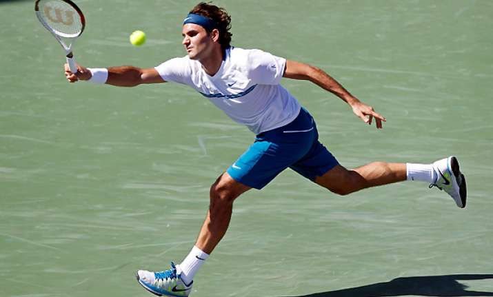 federer beats american harrison at key biscayne